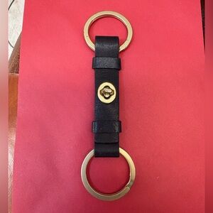 UNIQUE RARE COACH Elegant Black Leather Keychain with Gold Accents